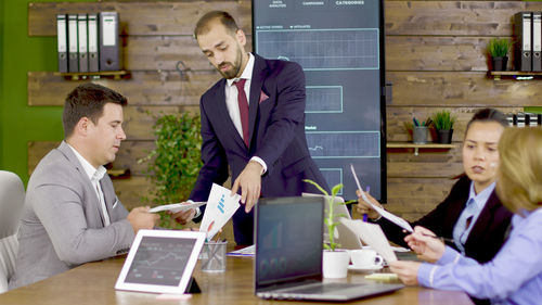 Business colleagues working at office