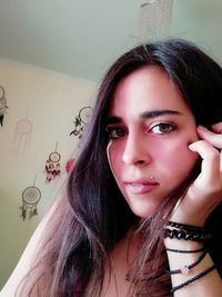 Portrait of beautiful woman at home