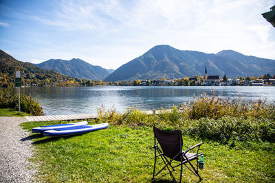 Scenic view of lake and mountains against sky