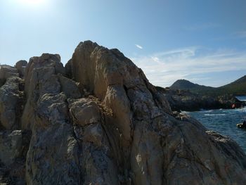 Scenic view of rock formations against sky