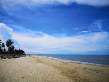 Scenic view of beach against sky