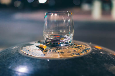 Close-up of wine glass on table