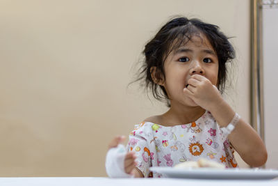 Girl having food in hospital