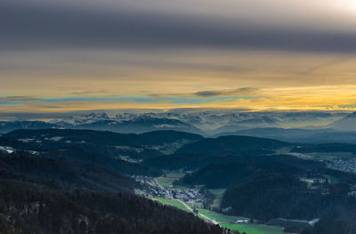 Scenic view of mountains against sky during sunset