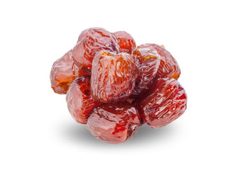 Close-up of strawberry over white background