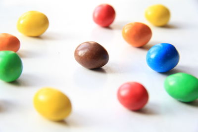 Close-up of multi colored balls on table