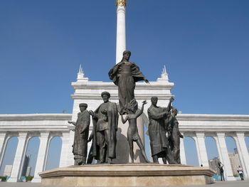 Low angle view of statue against sky