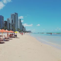 View of beach against blue sky