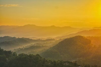 Scenic view of dramatic sky during sunset