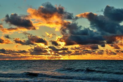 Scenic view of sea against sky during sunset