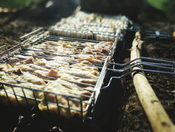 Close-up of meat on barbecue grill