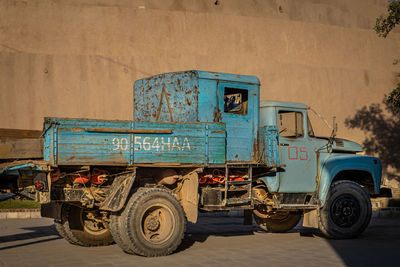 Old vintage car on street in city