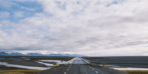 Surface level of road against sky