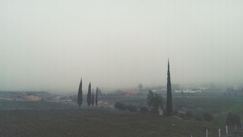 Scenic view of landscape during foggy weather