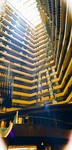 Low angle view of illuminated buildings in city