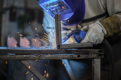 Man working on metal structure