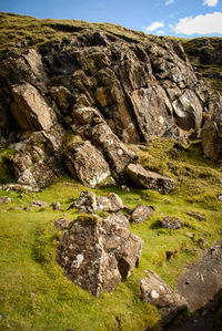 Rock formations on landscape against sky, quiraing in scotland