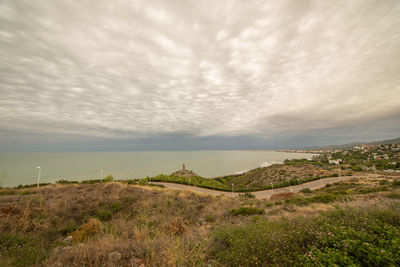 Scenic view of land against sky