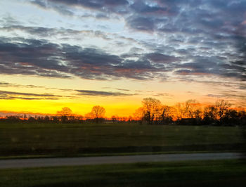 Scenic view of dramatic sky during sunset