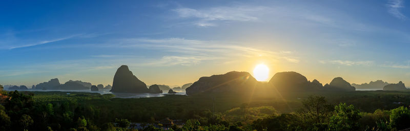 Scenic view of sunset over mountain