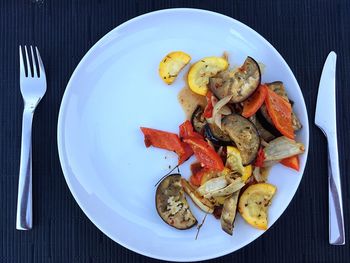 Directly above of fried vegetable slices served on plate