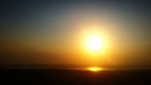 Scenic view of sunset over sea