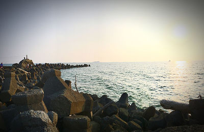 Scenic view of sea against clear sky during sunset