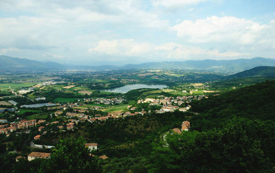 Aerial view of townscape against sky