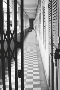 Corridor of building with sliding gate