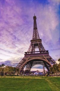 View of eiffel tower against cloudy sky