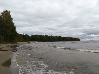 Scenic view of beach against sky