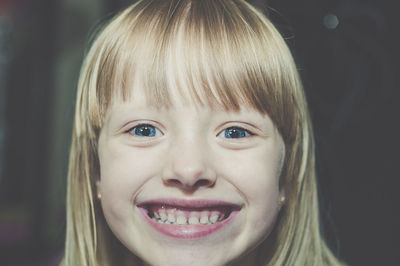 Close-up portrait of smiling girl