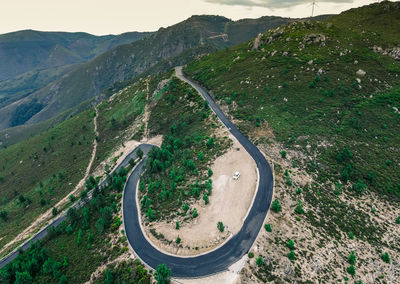 High angle view of road amidst mountain