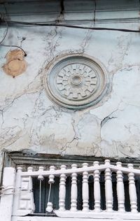 Low angle view of carvings on wall in old building