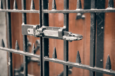 Close-up of rusty metal fence 