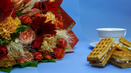 Close-up of various flowers on table