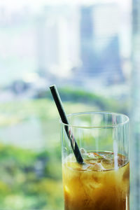 Close-up of beer glass on table