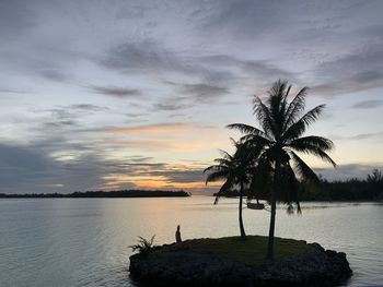 Scenic view of sea against sky at sunset