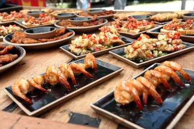 High angle view of meat on barbecue grill