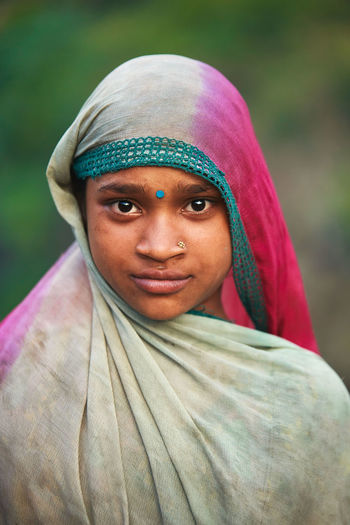 Portrait of young woman wearing sari