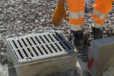 High angle view of manhole on road