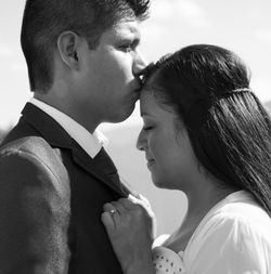 Close-up of couple holding hands