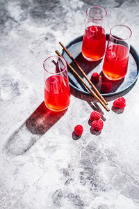 Red berries on glass