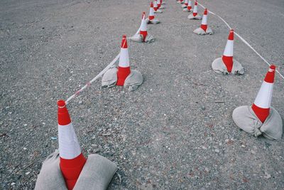 High angle view of traffic cones on field