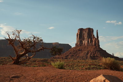 Rock formations on landscape against sky in monument valley