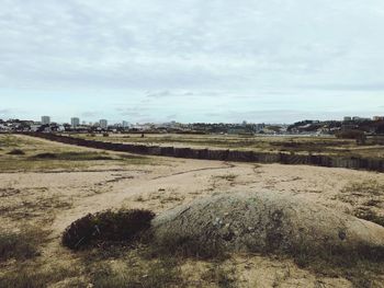 Scenic view of land against sky