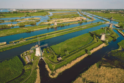 High angle view of people walking on field