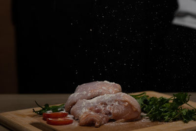 Close-up of meat on cutting board