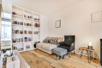 Chairs and tables on sofa at home