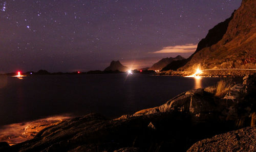 Scenic view of lake at night